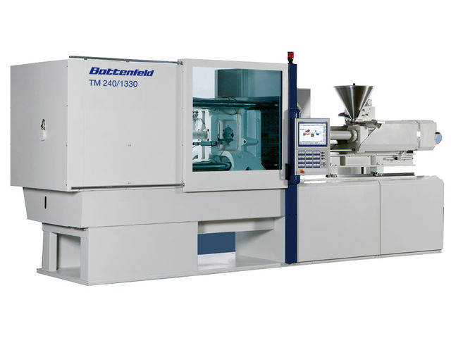 Presse à injecter horizontale hydraulique à genouillères : TM 