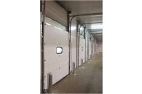 Potelet de protection pour porte industrielle