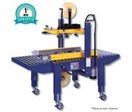 Machine de fermeture par ruban adhésif 