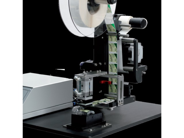 Machine de pose semi-automatique d’étiquettes