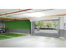 Rideau à lame et grilles à enroulement TGT pour garages collectifs