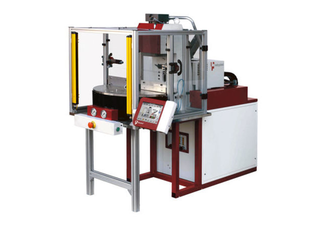 PRESSE À INJECTER HYDRAULIQUE AVEC TABLE ROTATIVE