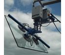 Palonnier à ventouses avec basculement motorisé pour la pose de vitrages sur chantier| AXITEC 