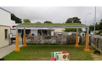 Préau écologique à toiture végétale | Koman Groupe