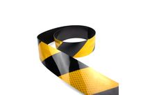 Rouleau adhésif rétro-réfléchissant avec hachurage de sécurité