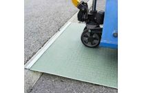 Plaque pour franchissement de trottoir