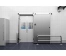 Porte coulissante pour chambre froide et chambre grand froid