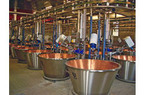 Mélangeur à roue et vitesse variable pour la production du fromage