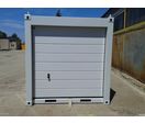 Conteneur de stockage pour garage avec porte sectionnelle