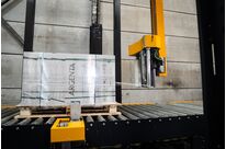 Banderoleuse automatique à bras tournant