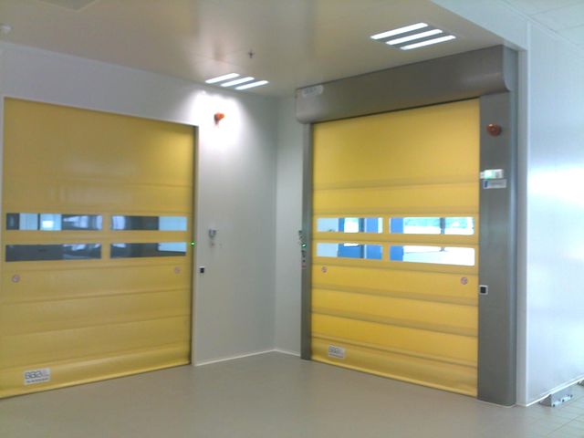 PORTE SOUPLE AUTOMATIQUE PAR ENROULEMENT POUR L'INDUSTRIE PHARMACEUTIQUE ET AGROALIMENTAIRE