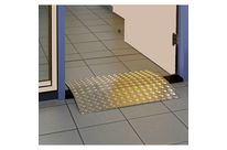 Plaque de franchissement pour seuils de portes